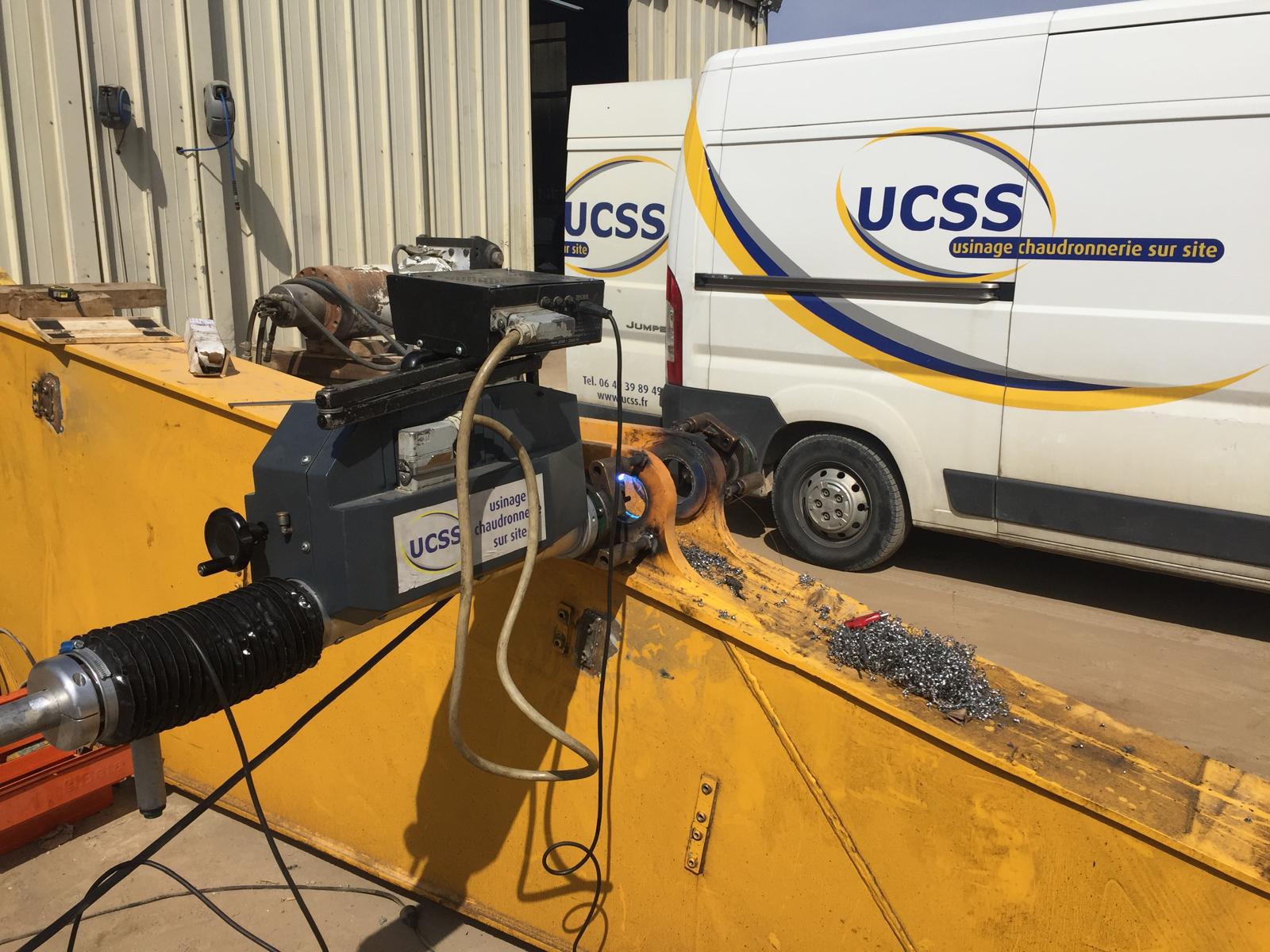 Usinage sur site UCSS : réalésage sur bras de pelle avec machine portable