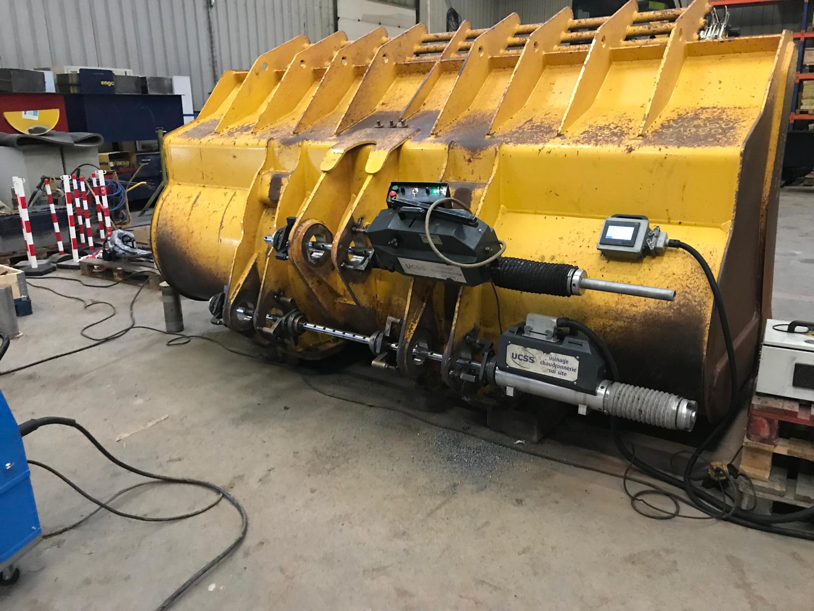 Usinage sur site UCSS : réalésage des axes d’un godet de chargeuse